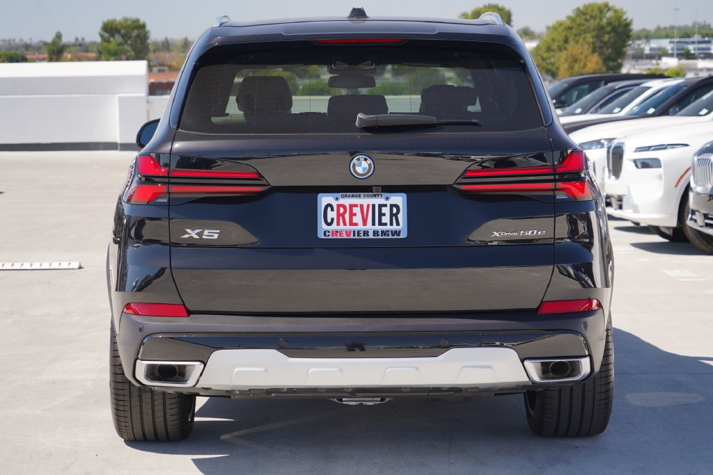 New 2026 Black Sapphire Metallic BMW xDrive50e image 8
