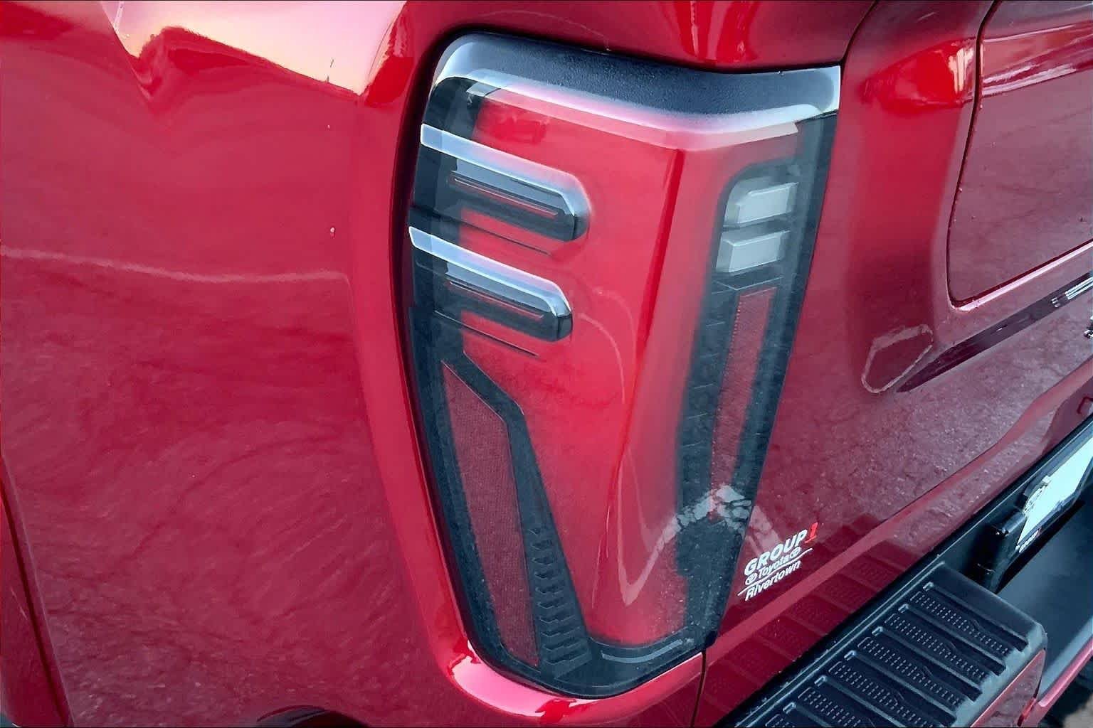 Used 2024 Volcanic Red Tintcoat GMC AT4 image 25