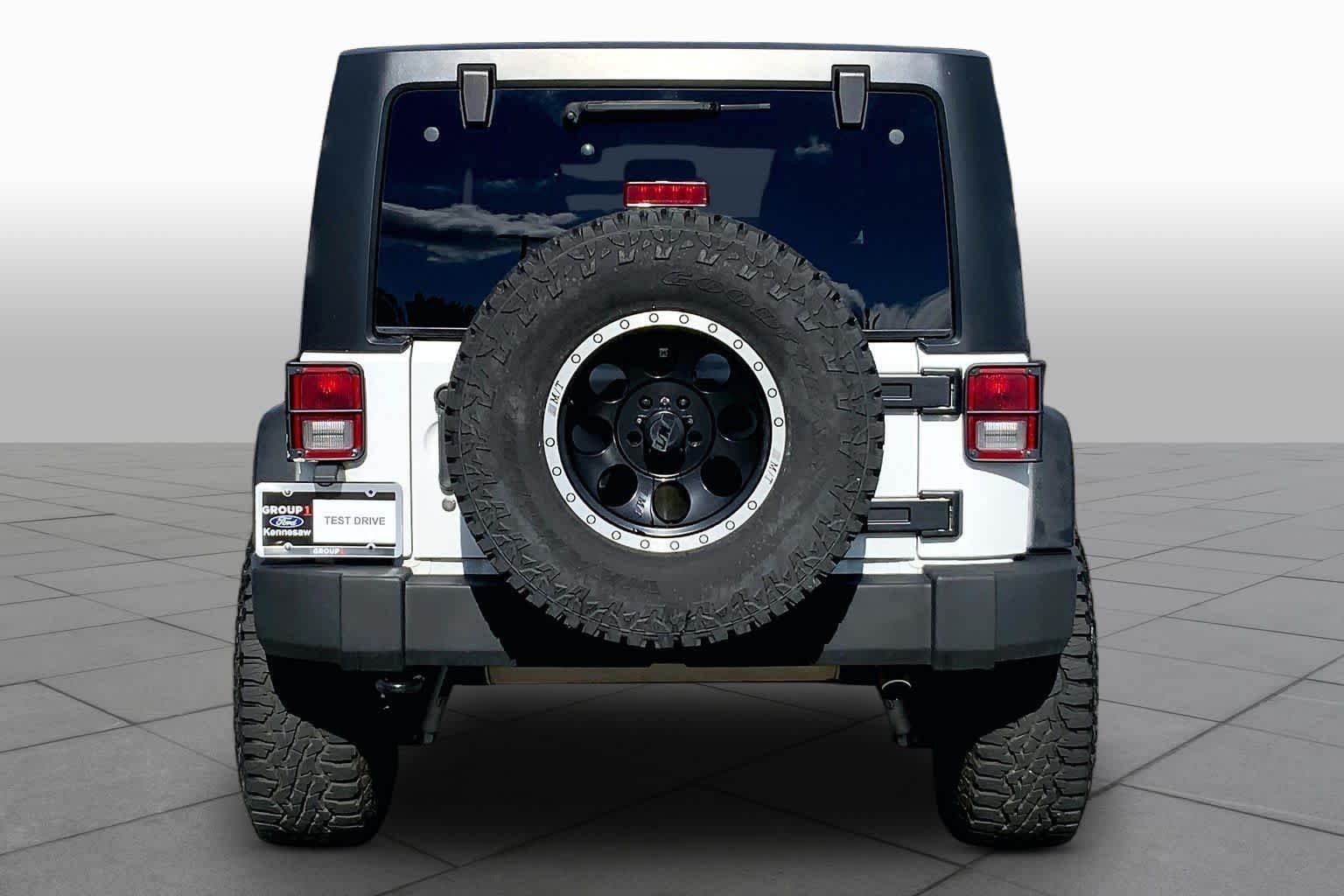 Used 2017 Bright White Clearcoat Jeep Sport image 5