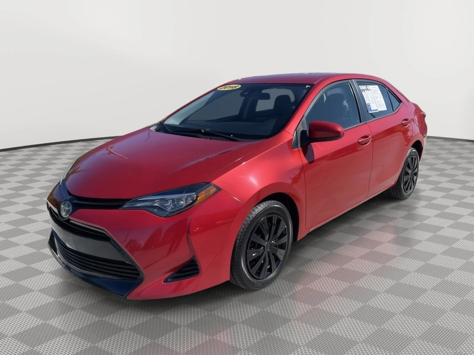 Used 2018 Barcelona Red Metallic Toyota LE image 4