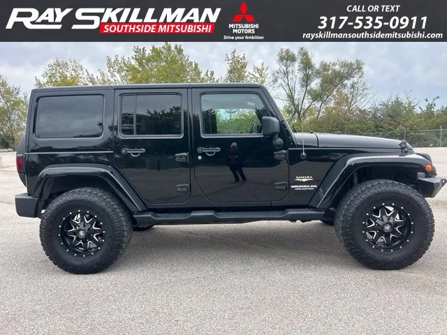 Used 2014 Black Jeep Unlimited Sahara image 4