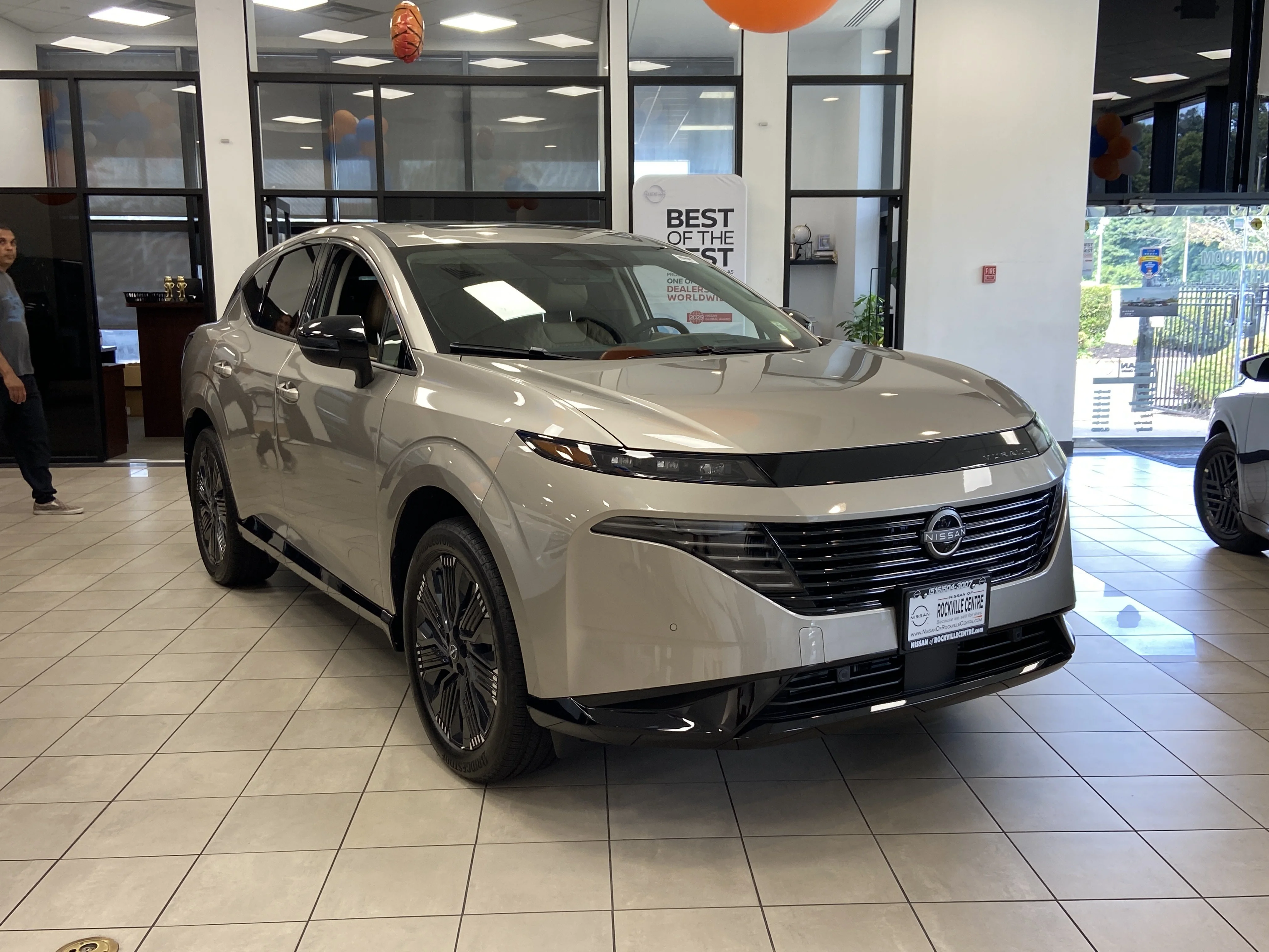 New 2026 Champagne Silver Metallic Nissan Platinum image 1