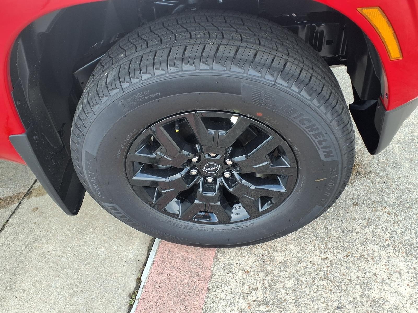 2026 Nissan Frontier SV Red at Robbins Nissan