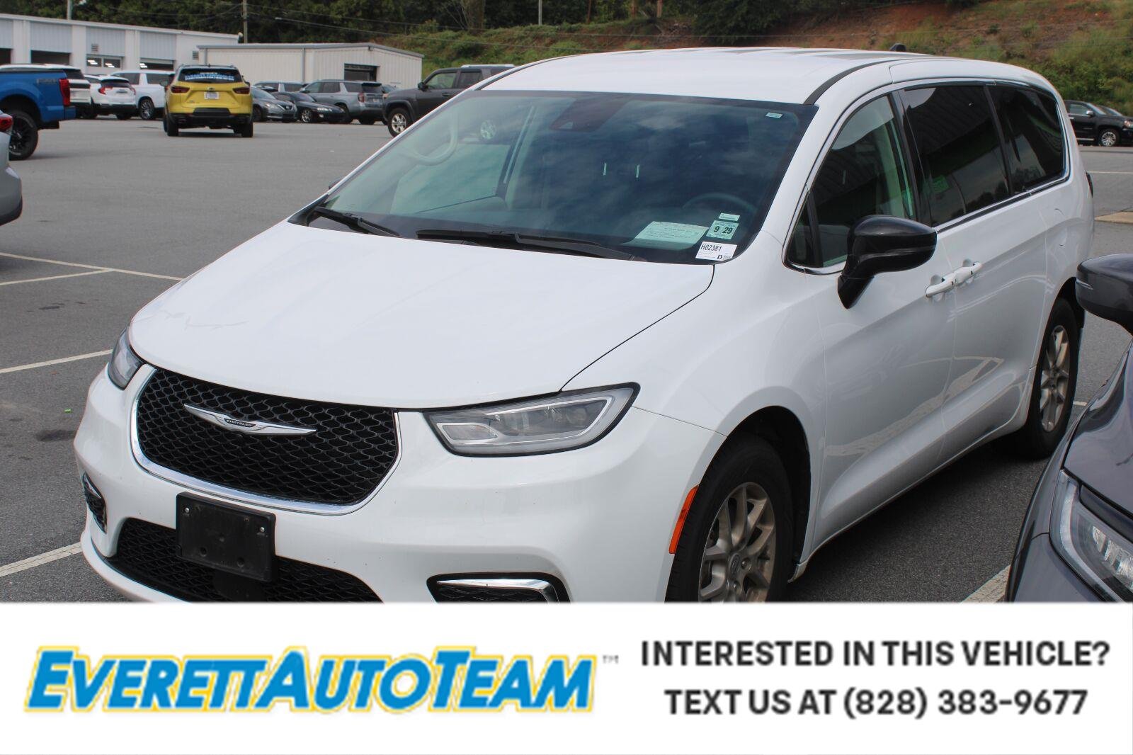 Used 2024 Bright White Clearcoat Chrysler Touring L image 1