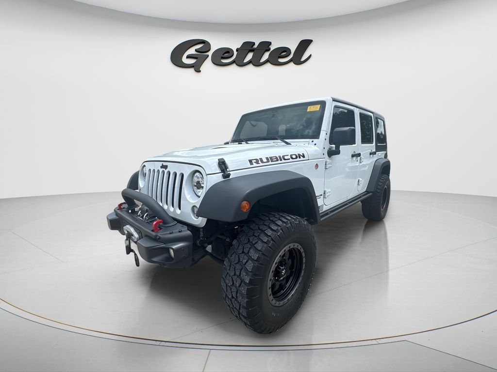 Used 2016 White Jeep Unlimited Rubicon image 1