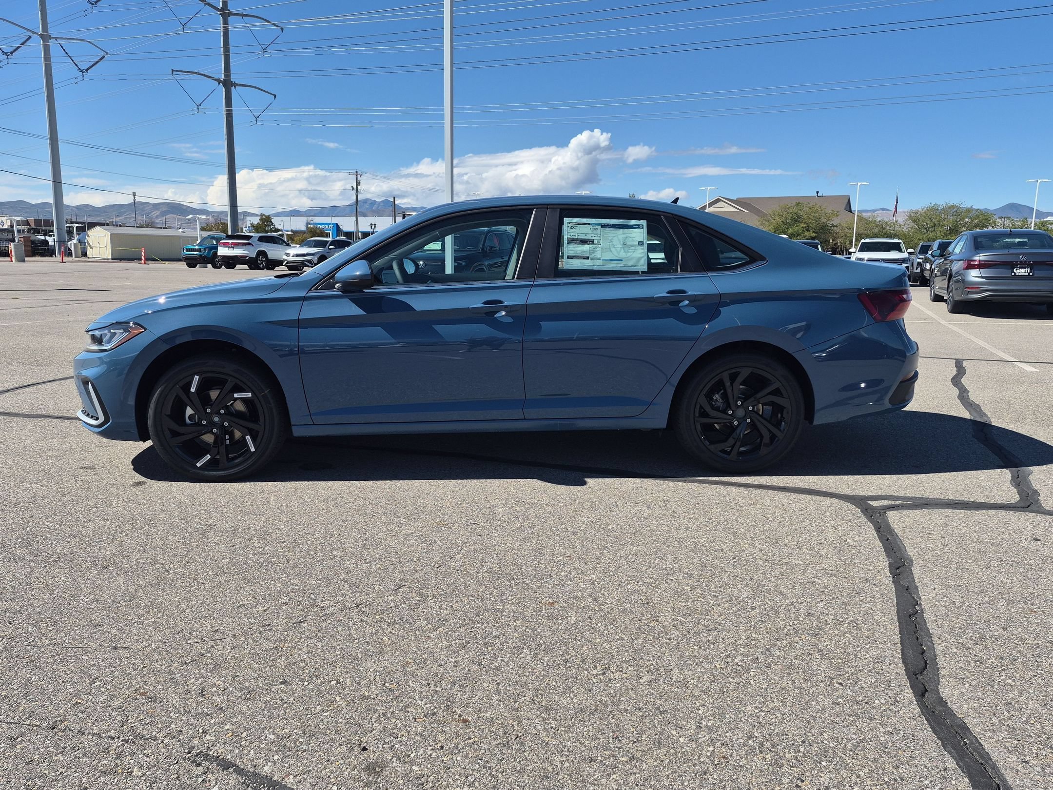 New 2027 Monterey Blue Pearl Volkswagen SE image 7