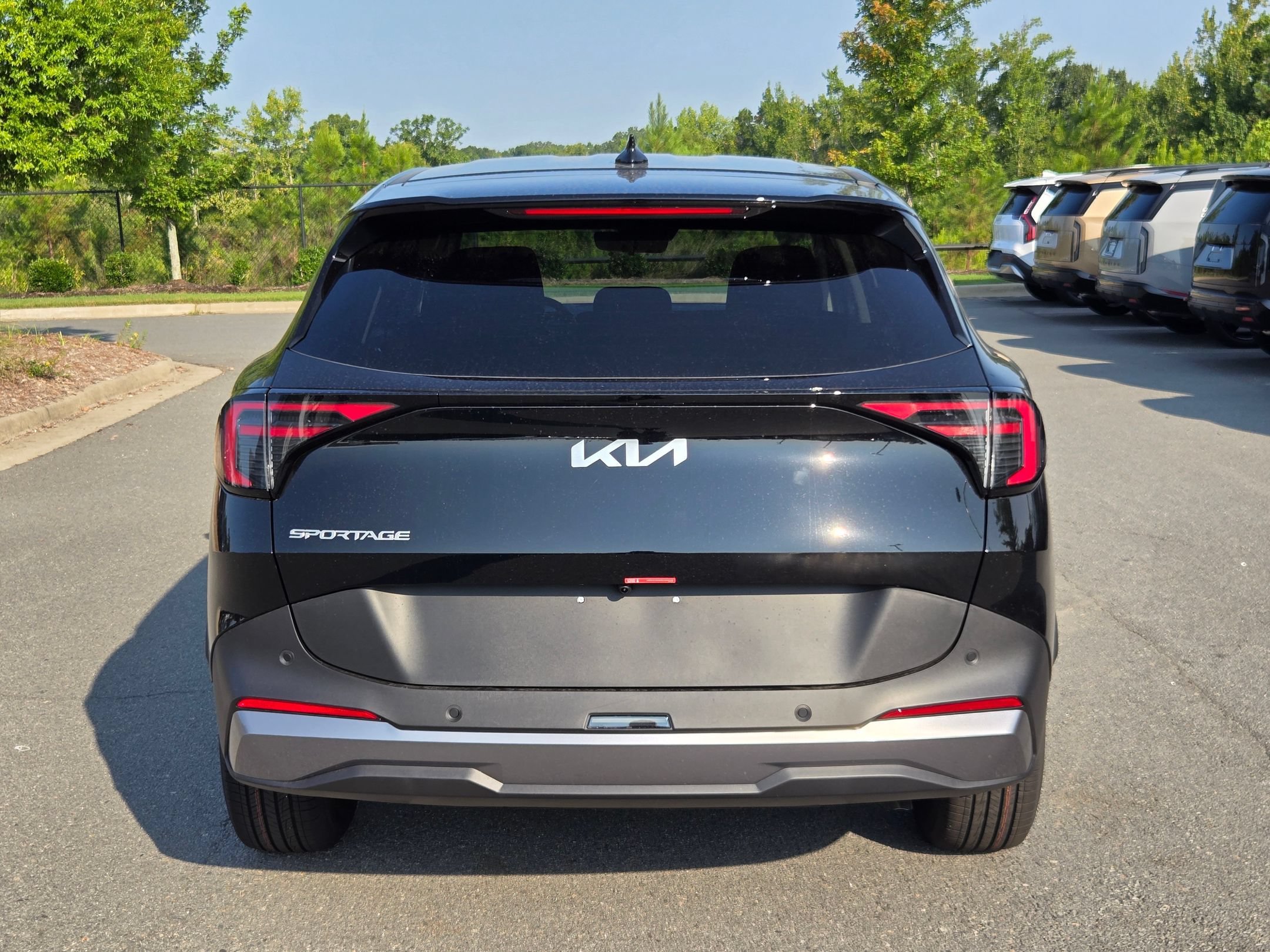 New 2026 Ebony Black Kia LX image 6