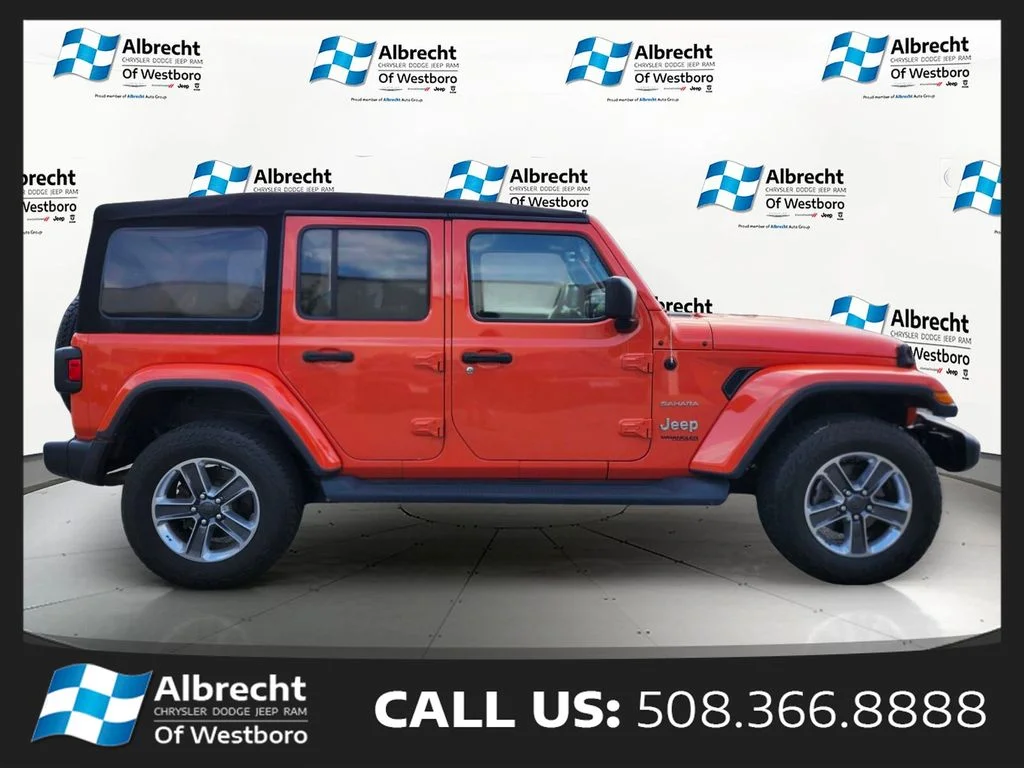 Used 2020 Orange Jeep Unlimited Sahara image 6