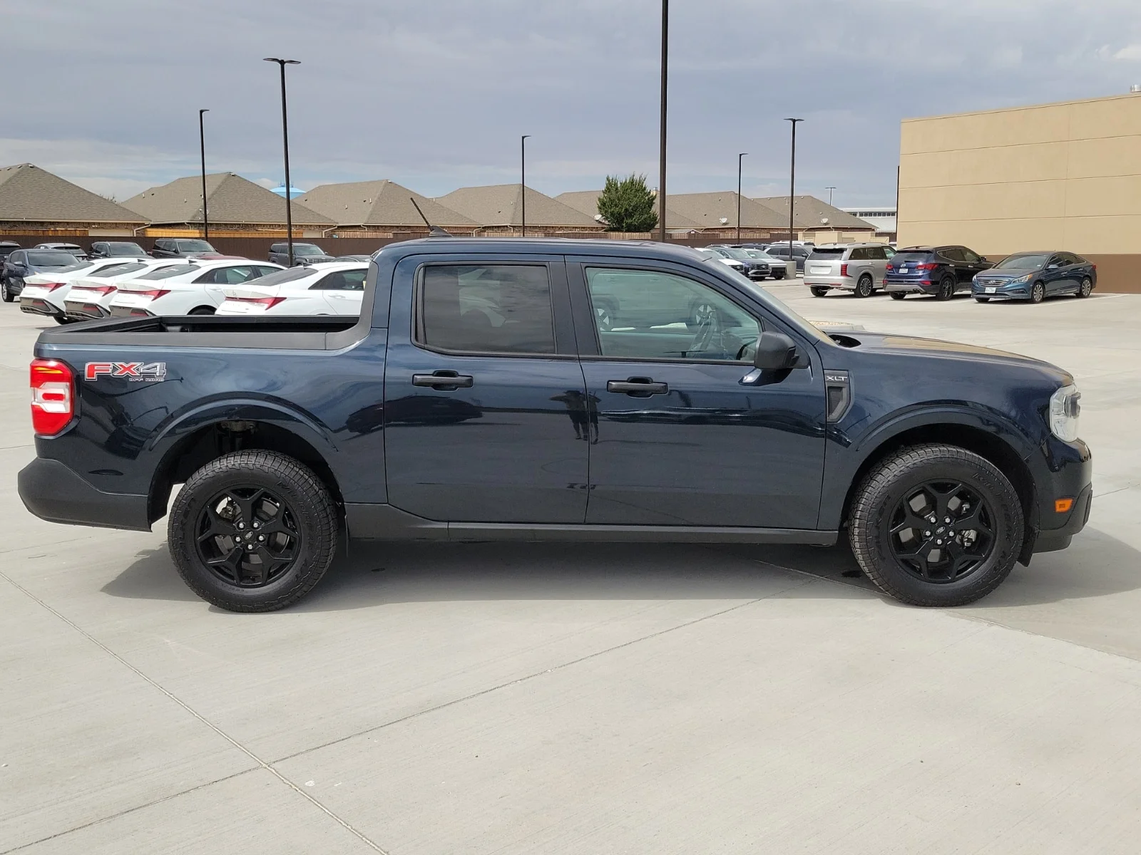 Used 2022 Blue Ford XLT All-Wheel Drive Supercrew 4.5 ft. box 121.1 in image 5
