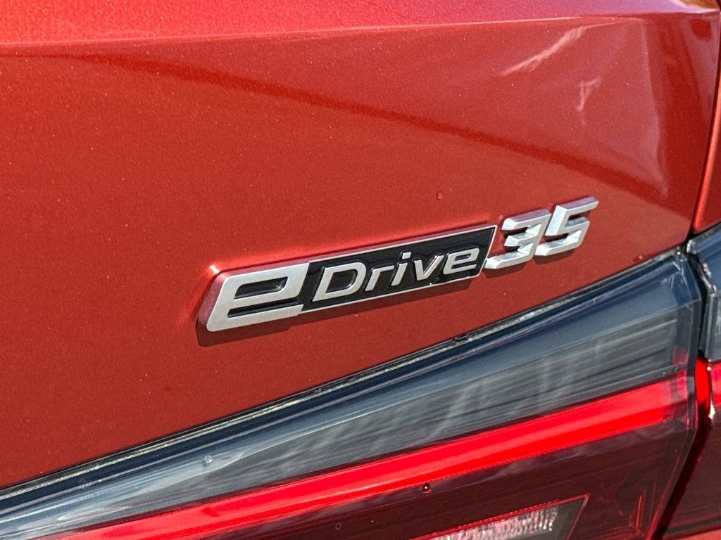 Certified Used 2023 Sunset Orange Metallic BMW eDrive35 image 10