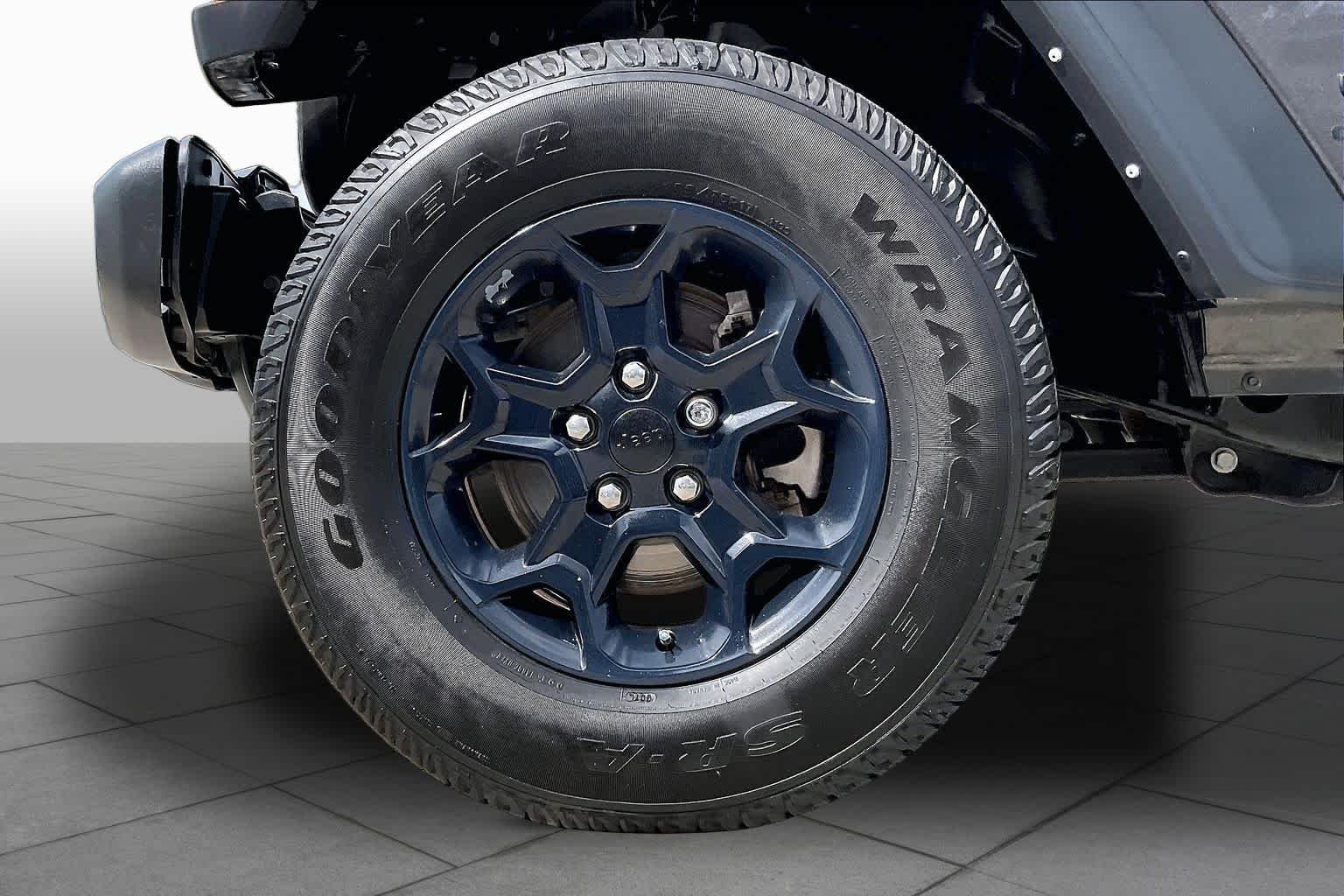 Used 2023 Granite Crystal Metallic Clearcoat Jeep Sport image 11