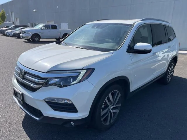 Used 2016 White Diamond Pearl Honda Touring image 1