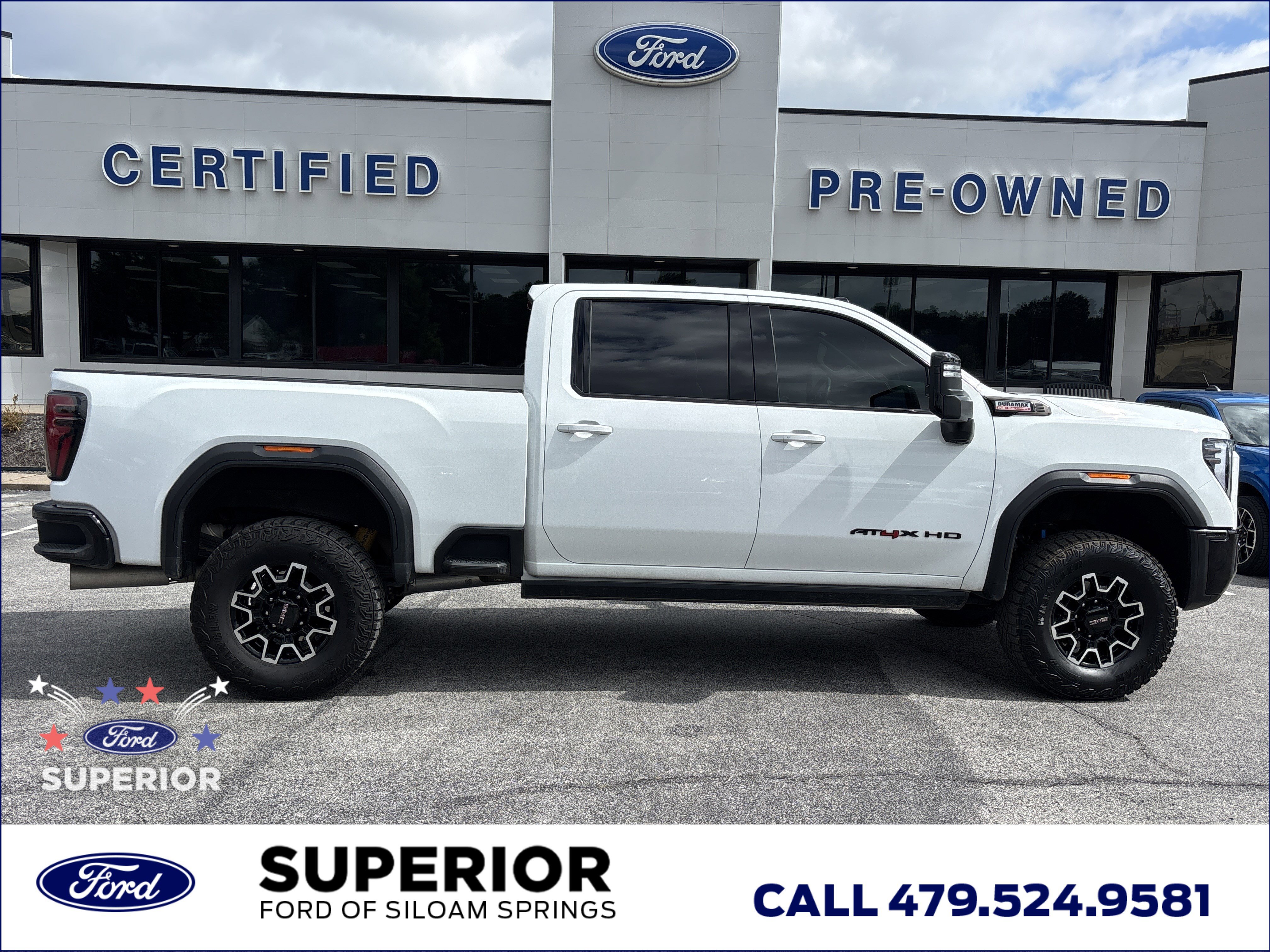 Used 2024 Summit White GMC AT4X Crew Cab 4WD image 2