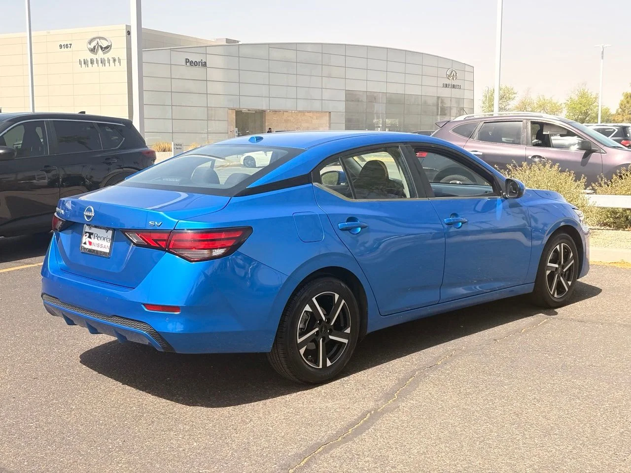 Used 2024 Electric Blue Metallic Nissan SV image 7