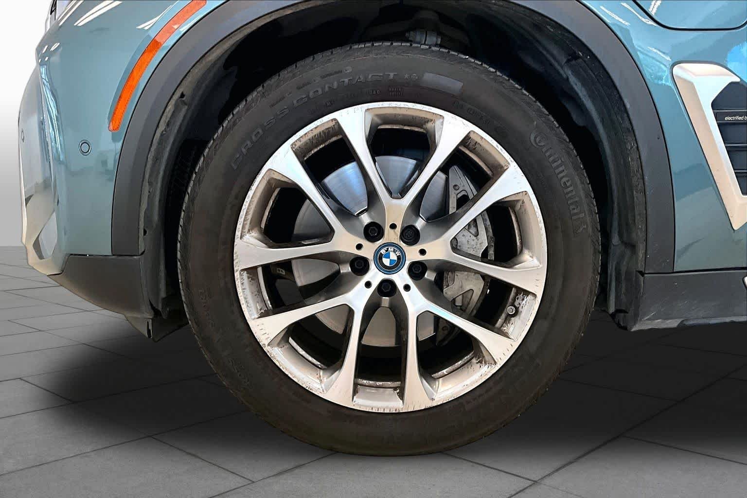 Used 2024 Blue Ridge Mountain Metallic BMW xDrive50e image 10