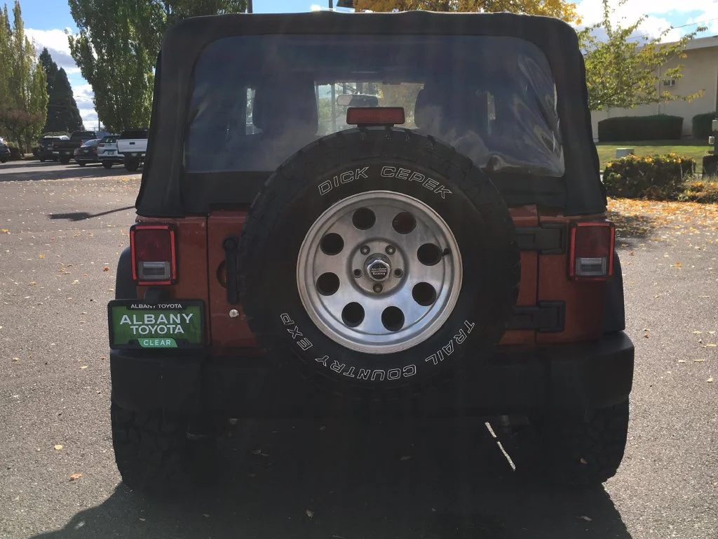 Used 2014 Orange Jeep Sport image 5
