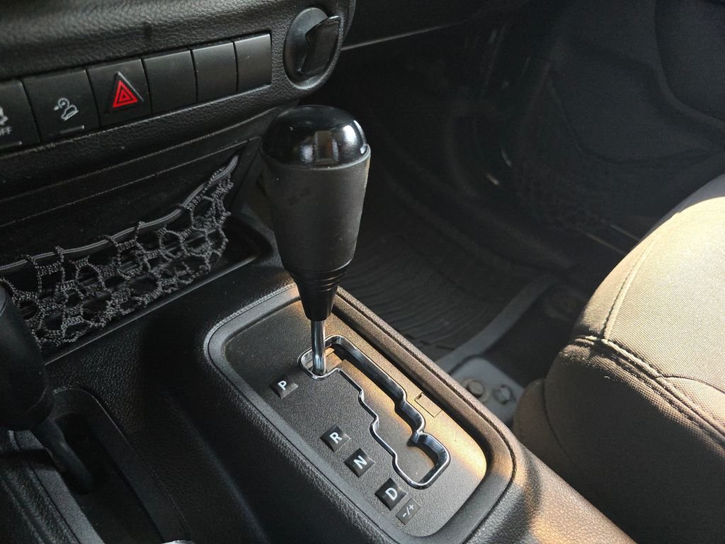 Used 2013 Black Jeep Unlimited Sport image 26