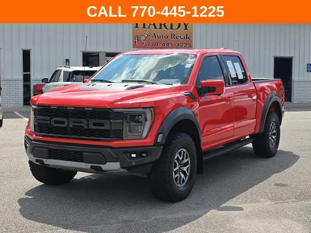 Certified Used 2022 Orange Ford Raptor image 1