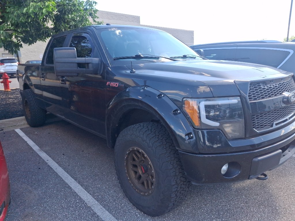 Used 2012 Tuxedo Black Metallic Ford FX4 image 2