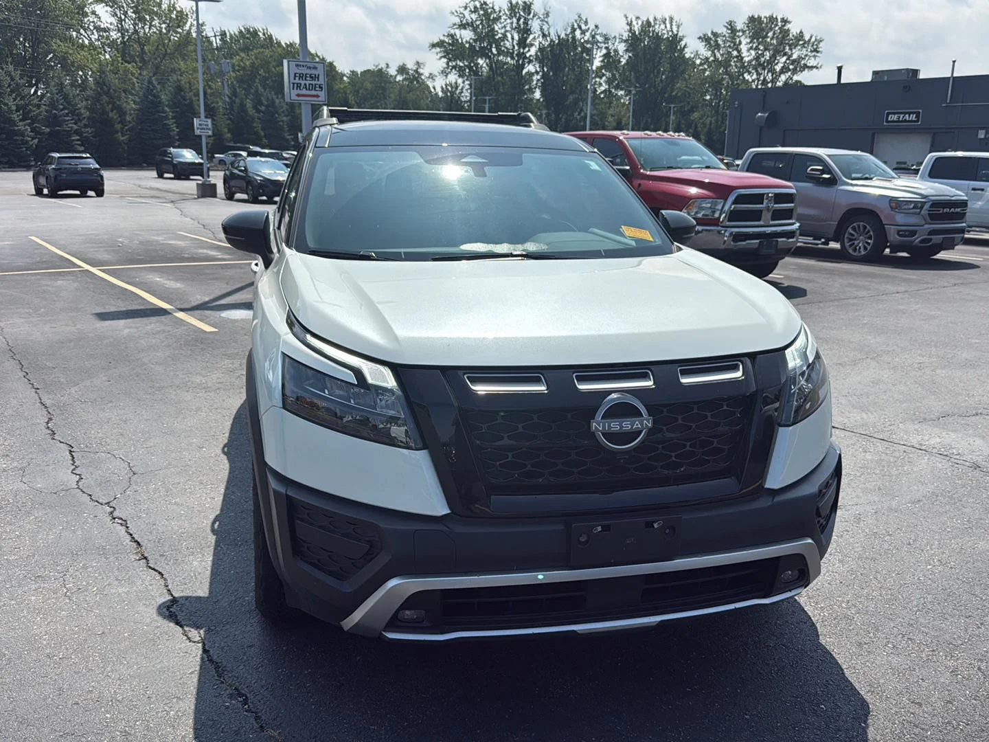 Used 2024 Pearl White Tricoat/Super Black Nissan Rock Creek image 11
