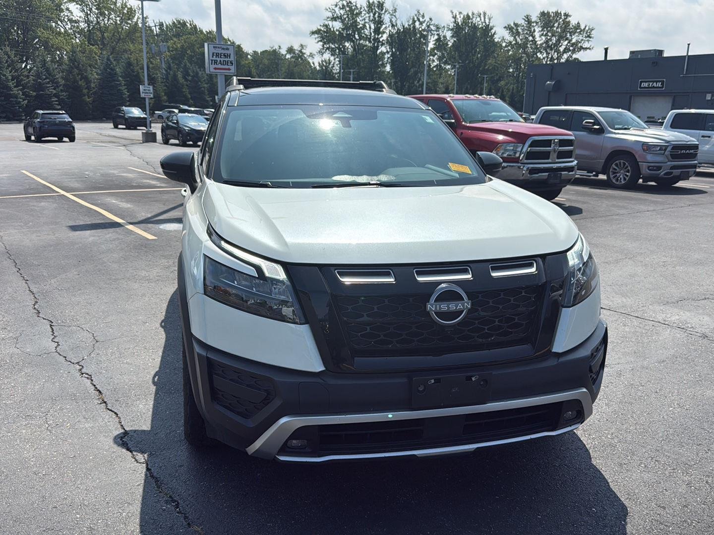 Used 2024 Pearl White Tricoat/Super Black Nissan Rock Creek image 11