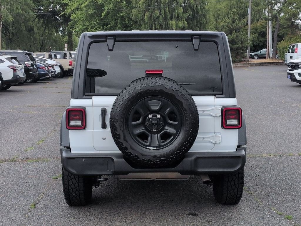 Used 2018 Bright White Clearcoat Jeep Unlimited Sport image 4