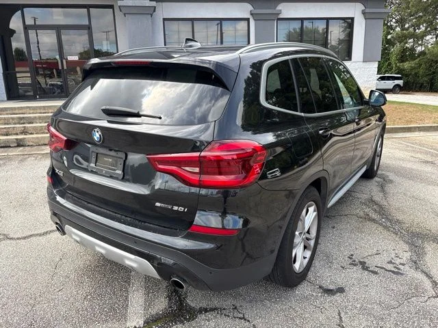 Used 2021 Black Sapphire Metallic BMW sDrive30i image 4