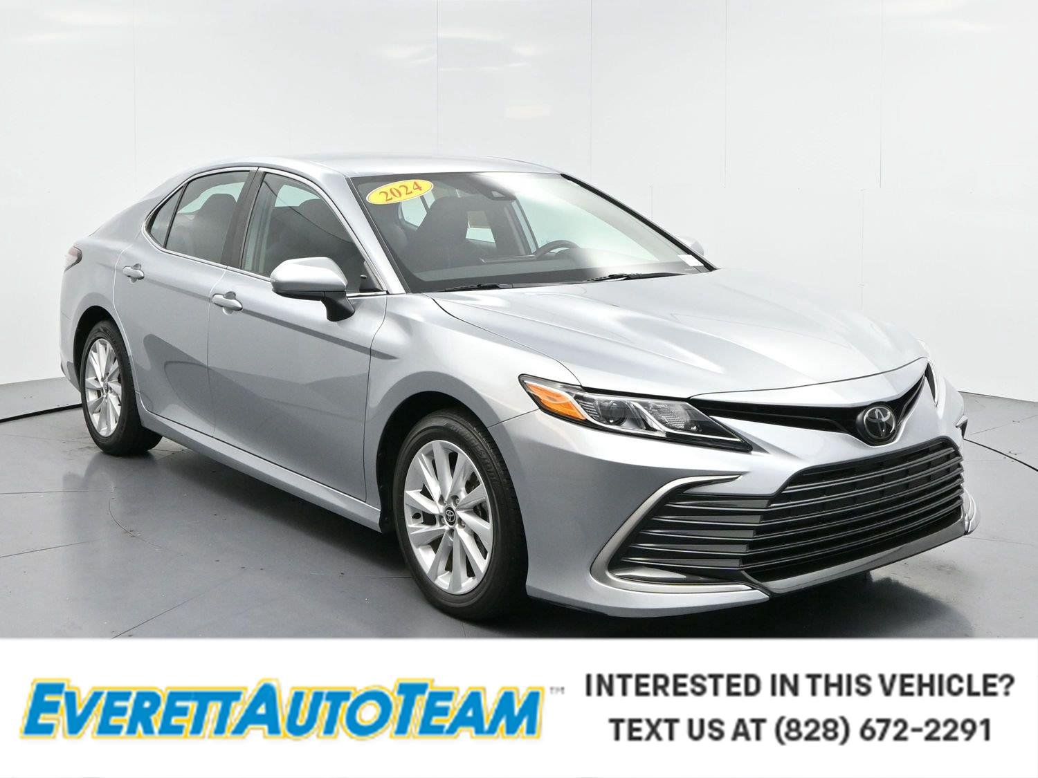 Used 2024 Celestial Silver Metallic Toyota LE image 1