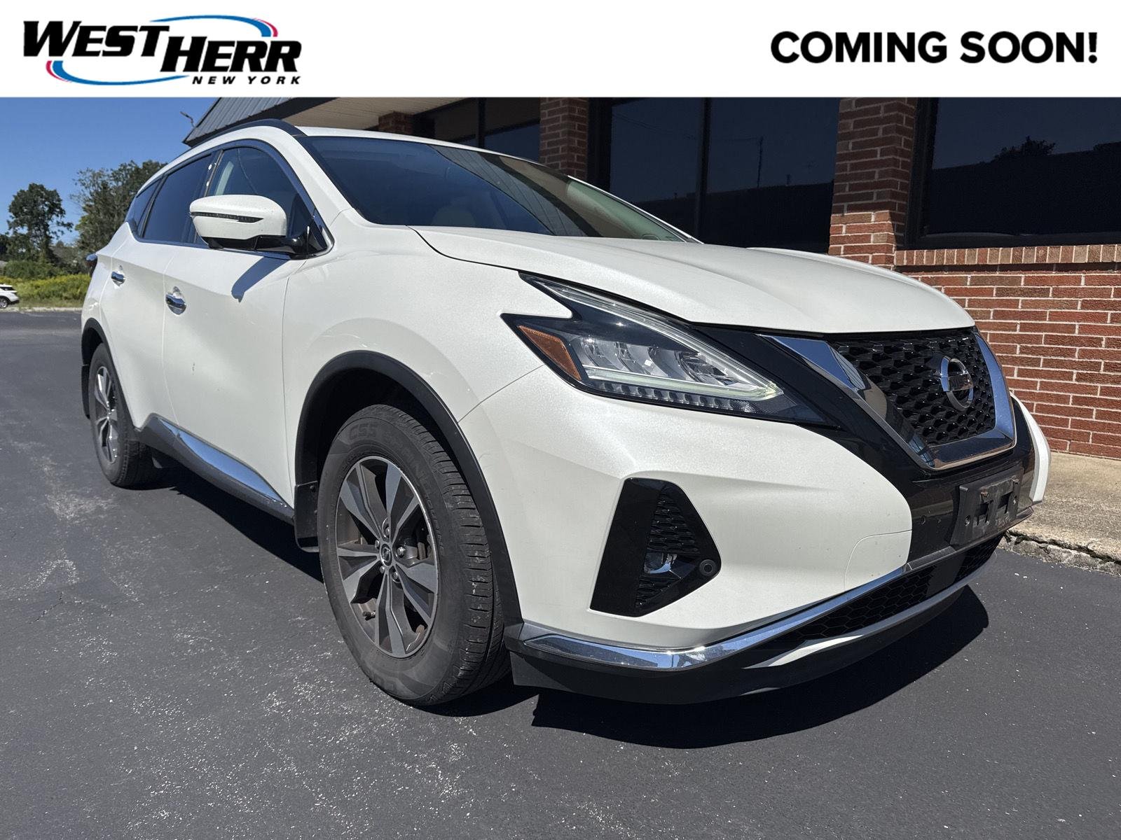 Used 2019 Pearl White Tricoat Nissan SV image 1