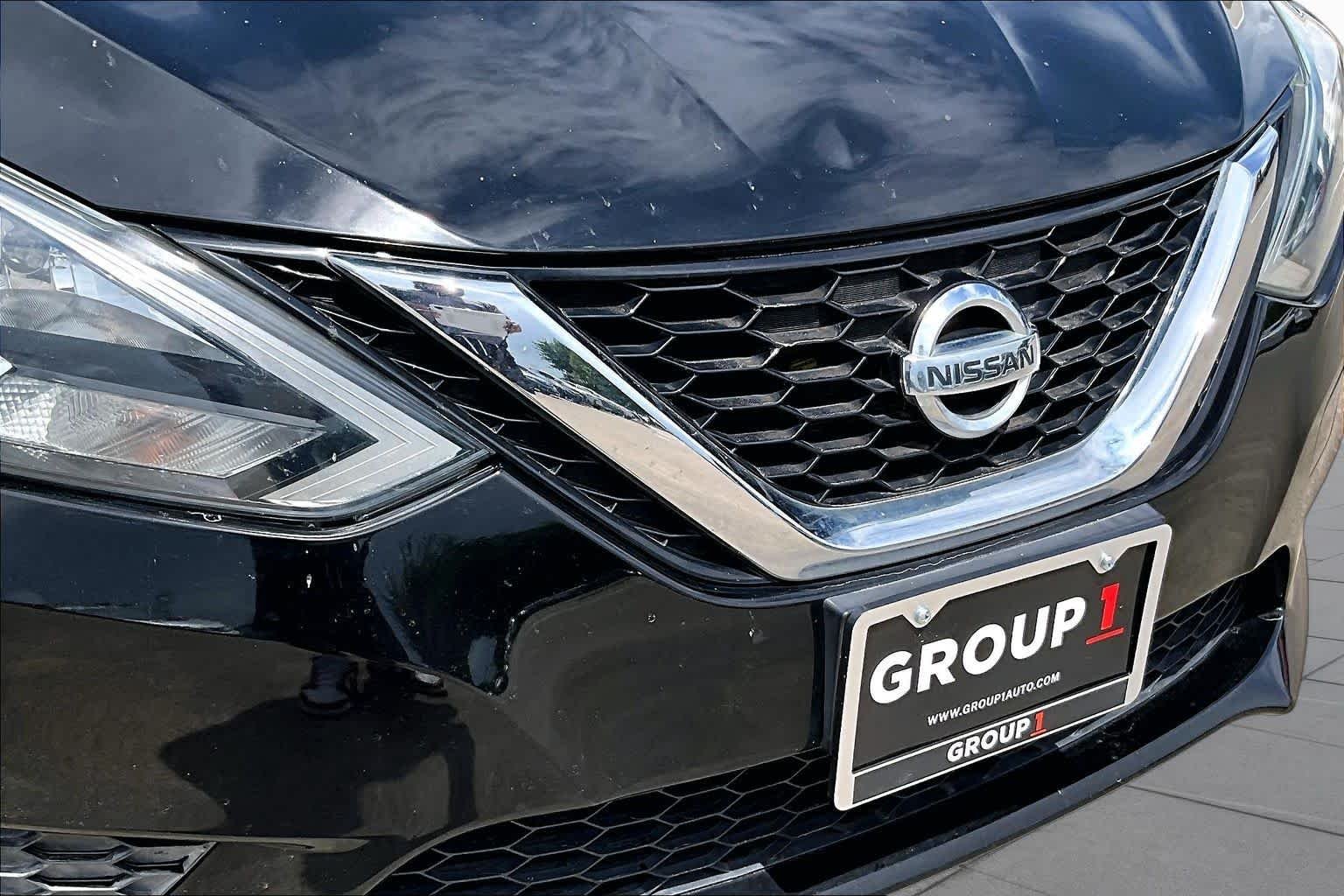 Used 2017 Super Black Nissan S image 26