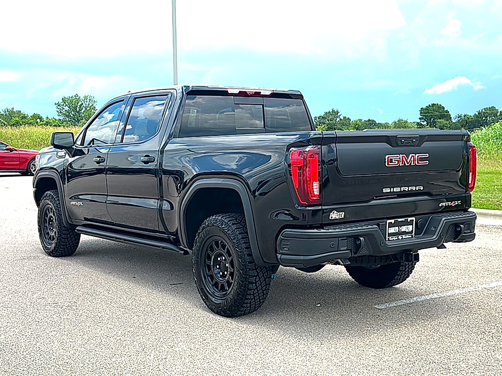 Used 2026 Onyx Black GMC Crew Cab, Short Bed, AT4X, 4WD image 6