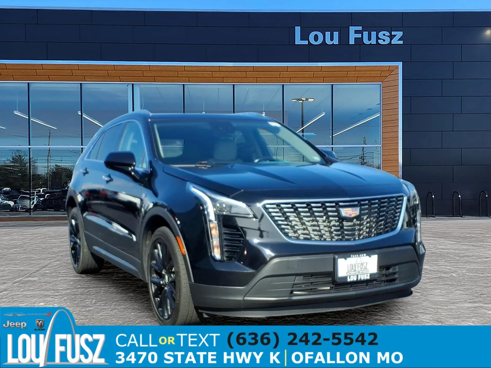 Used 2023 Stellar Black Metallic Cadillac AWD Luxury image 1
