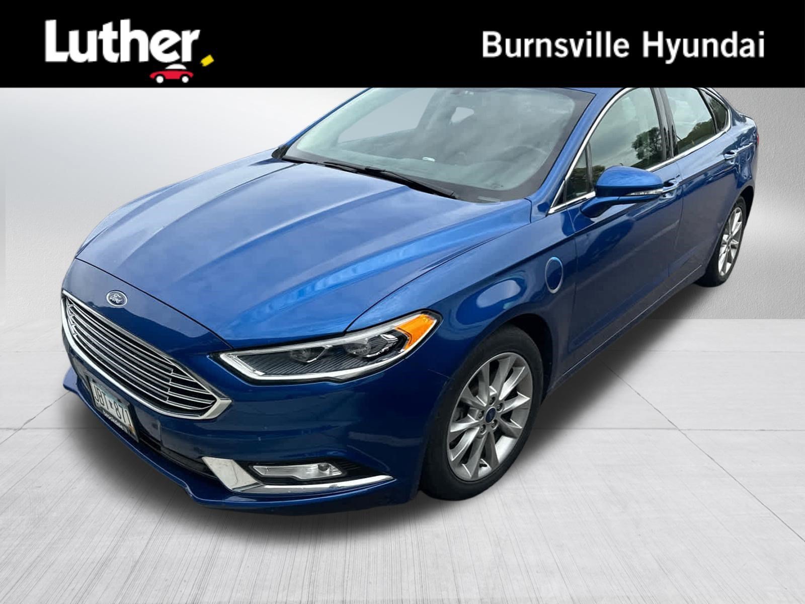 Used 2017 Lightning Blue Metallic Ford Titanium image 1