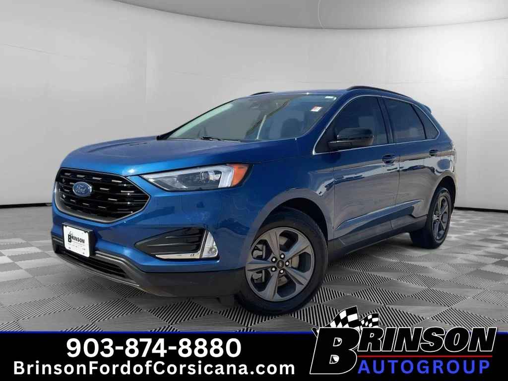 Used 2022 Atlas Blue Metallic Ford SEL image 1