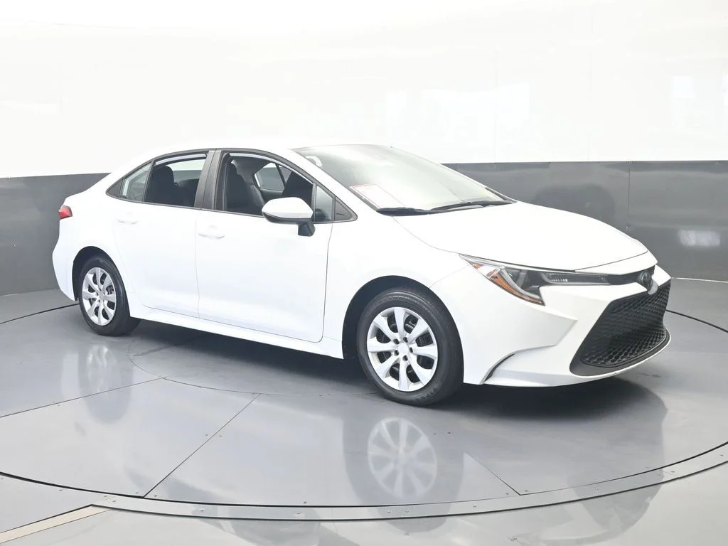 Used 2021 Super White Toyota LE image 7