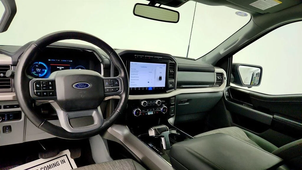 Used 2023 Azure Gray Metallic Tri-Coat Ford XLT 4WD SuperCrew 5.5