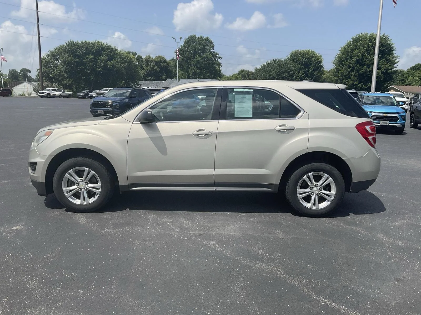 Used 2016 Champagne Silver Metallic Chevrolet LS image 4