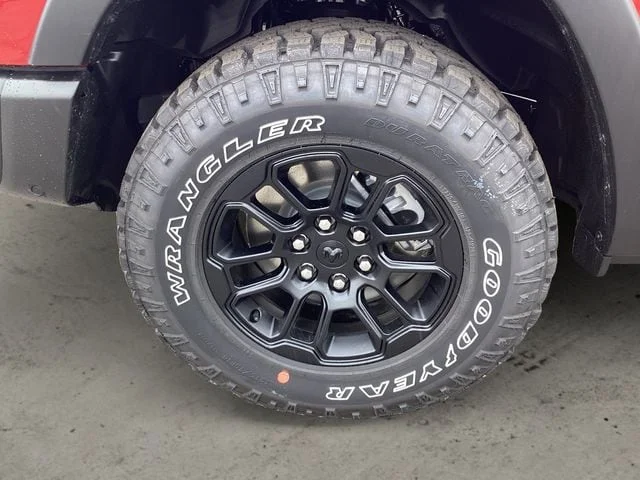 New 2026 Molten Red Ram REBEL CREW CAB 4X4 5