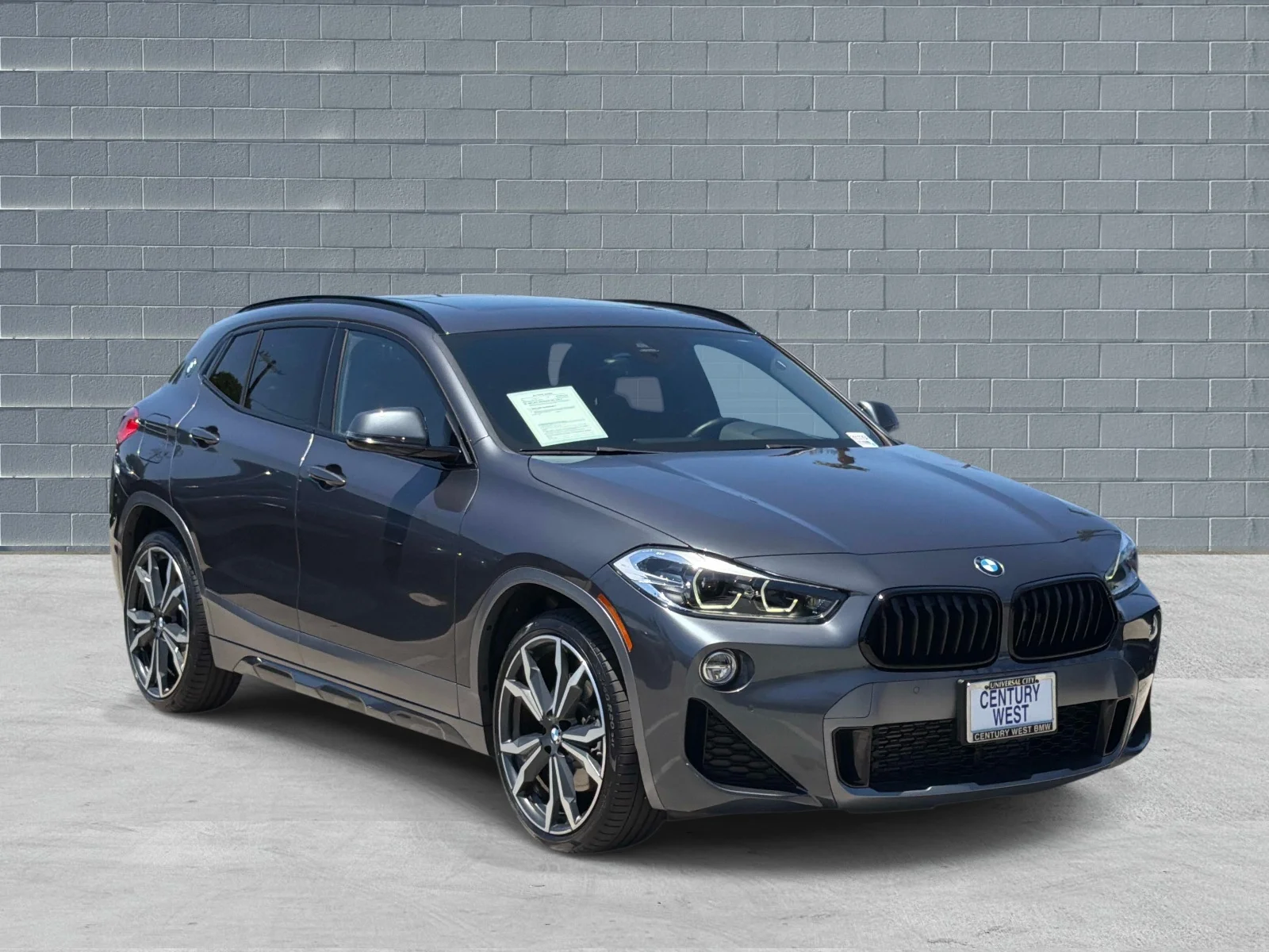 Used 2020 Mineral Gray Metallic BMW sDrive28i Sports Activity Coupe image 1