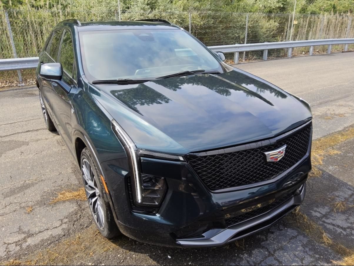 Used 2025 Emerald Lake Metallic Cadillac Sport image 2