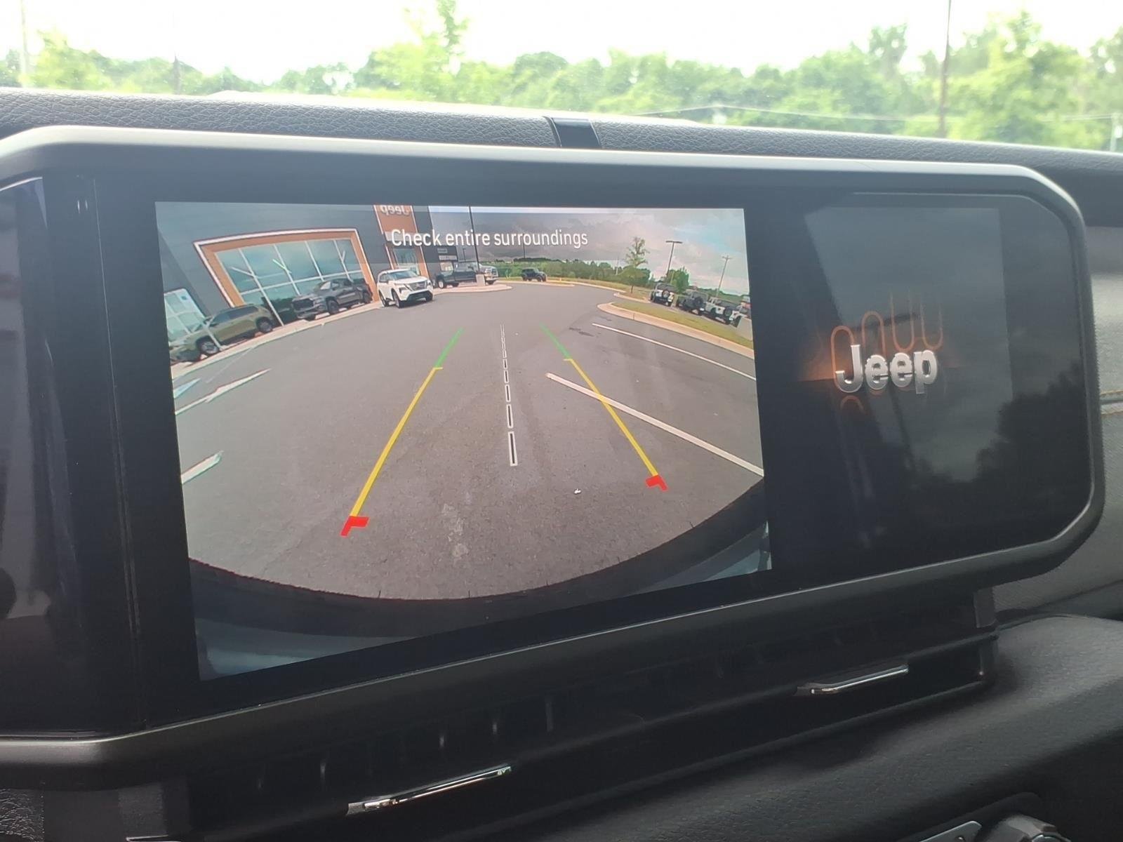 Used 2025 Fathom Blue Pearlcoat Jeep Sport S image 4