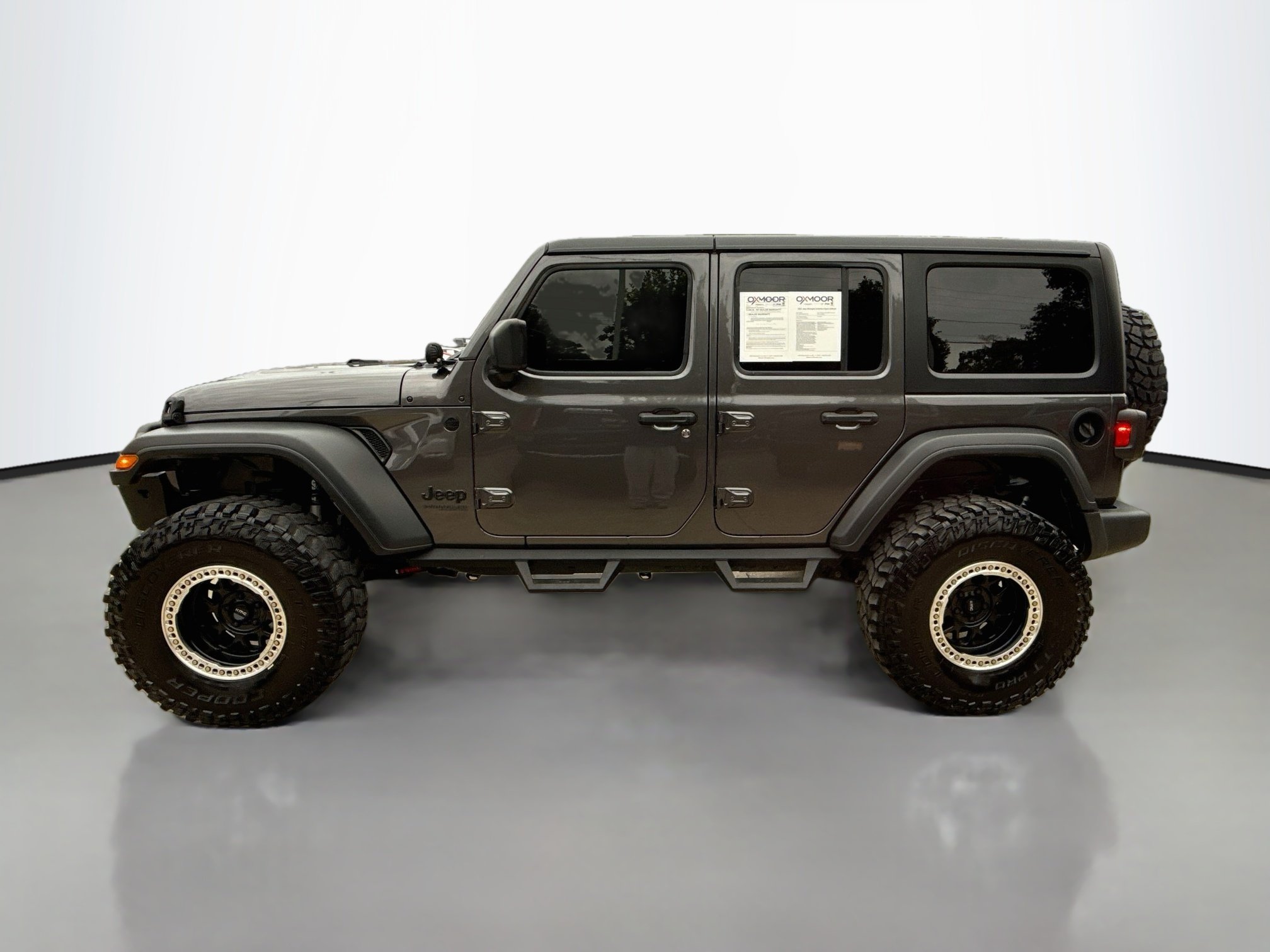 Used 2021 Granite Crystal Metallic Clearcoat Jeep Unlimited Sport Altitude image 4