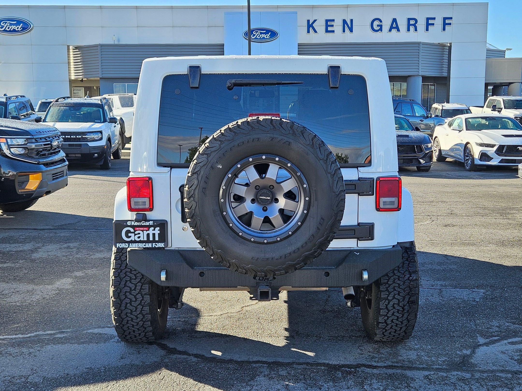 Used 2013 Bright White Clearcoat Jeep Sahara image 4