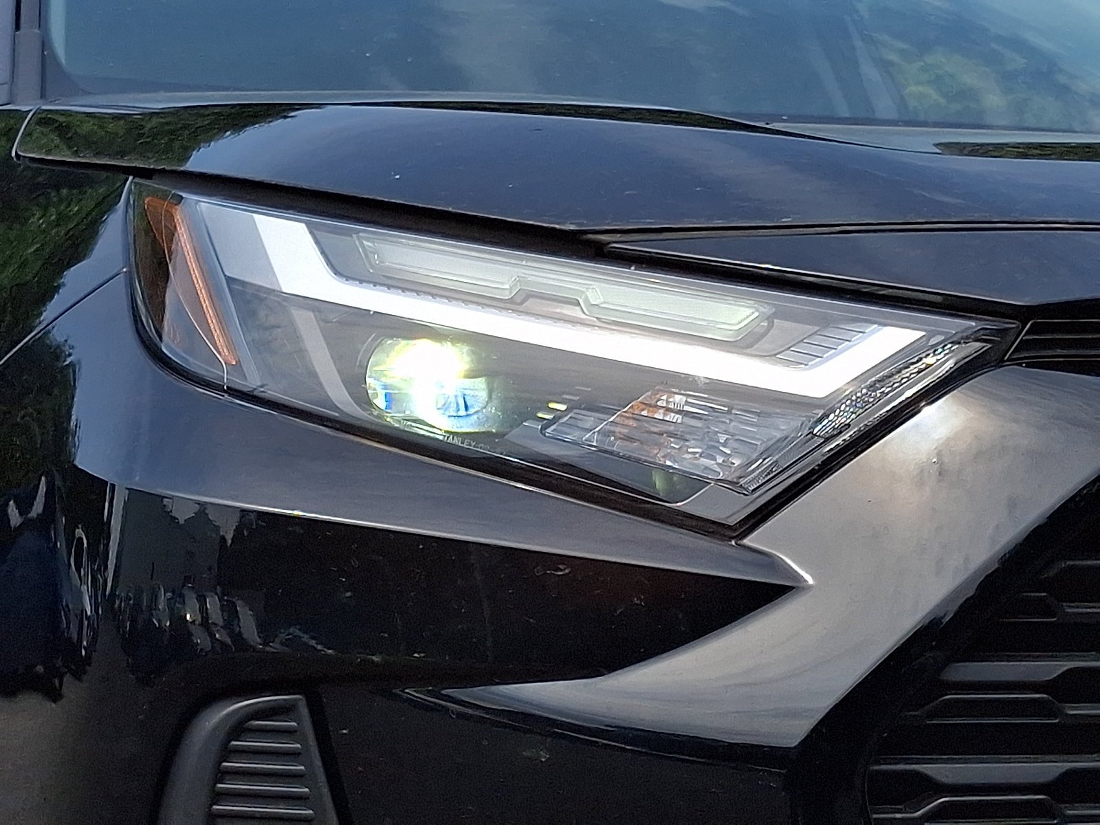 Used 2025 Midnight Black Metallic   218 Toyota Hybrid XLE image 8