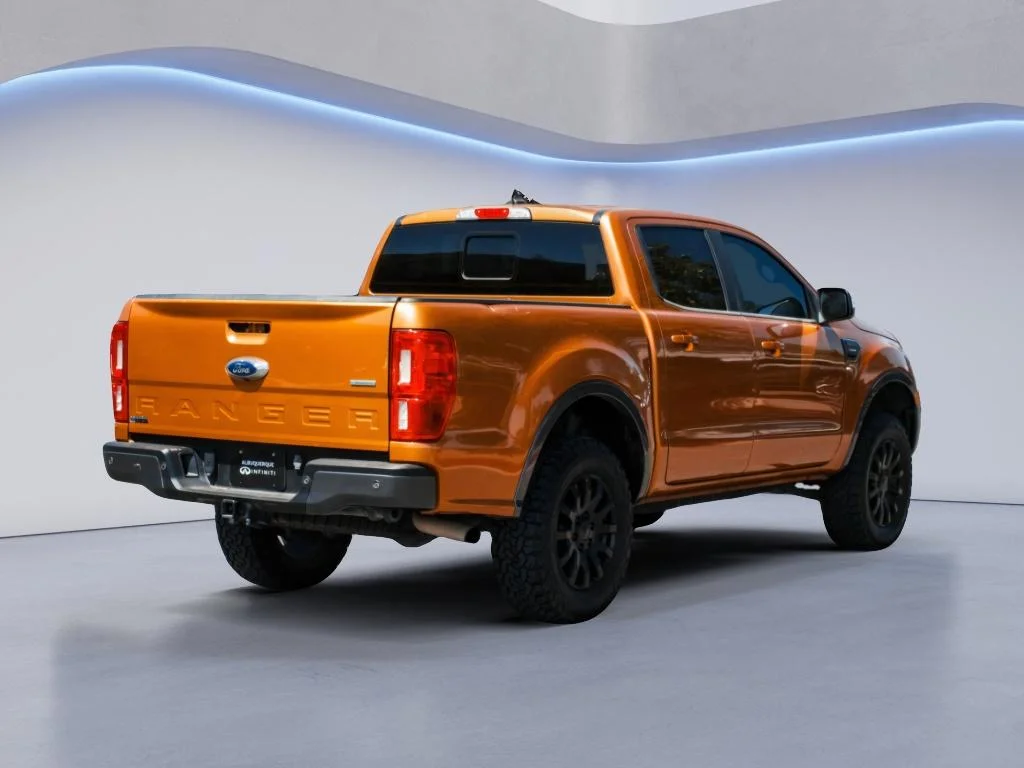 Used 2019 Orange Ford LARIAT image 5