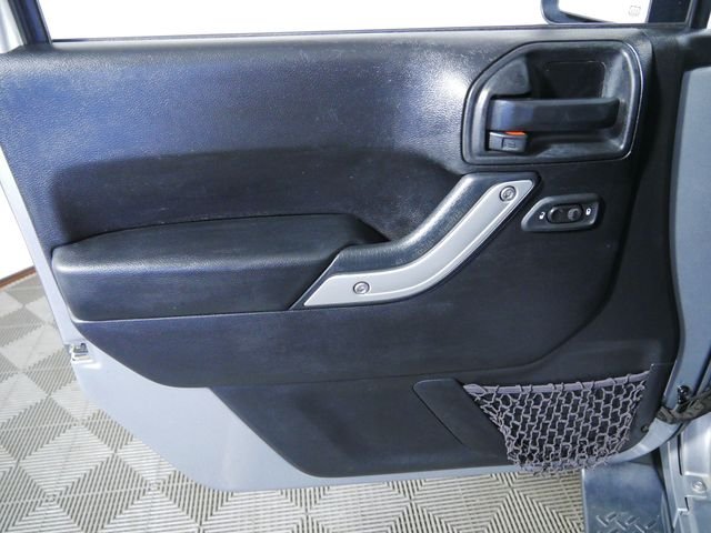 Used 2016 Silver Jeep Unlimited Sahara image 18
