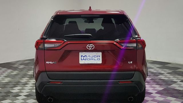 Used 2025 Red Toyota LE image 6