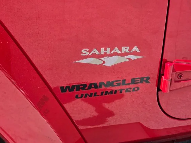 Used 2015 Red Jeep Unlimited Sahara image 11