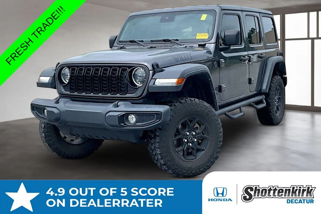 Used 2024 Gray Jeep Sport image 1