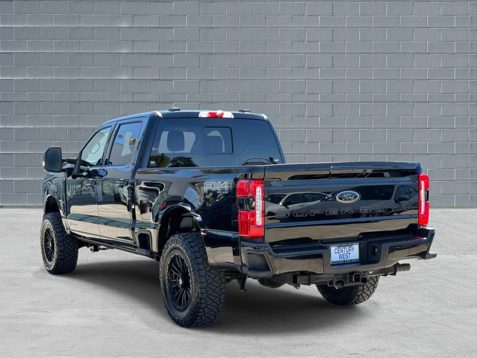 Used 2026 Agate Black Metallic Ford LARIAT 4WD Crew Cab 6.75